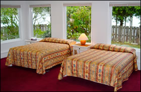 Island west resort lodge accomodations. Bedroom image